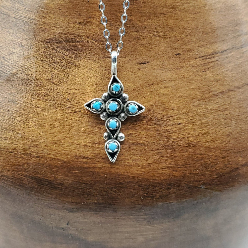 Cross with teardrop shape bezel with turquoise. Silver Chain Included