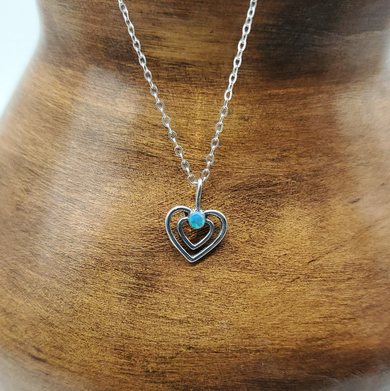 Tiny Double Heart with Blue Opal Stone.  Chain included