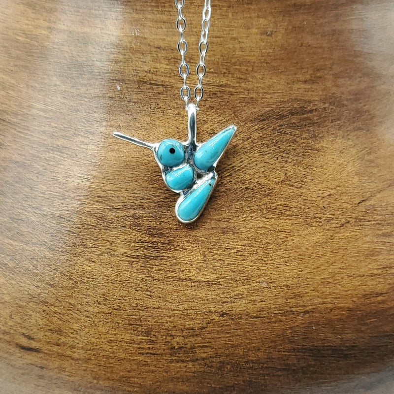 Turquoise Hummingbird pendant. Silver Chain
